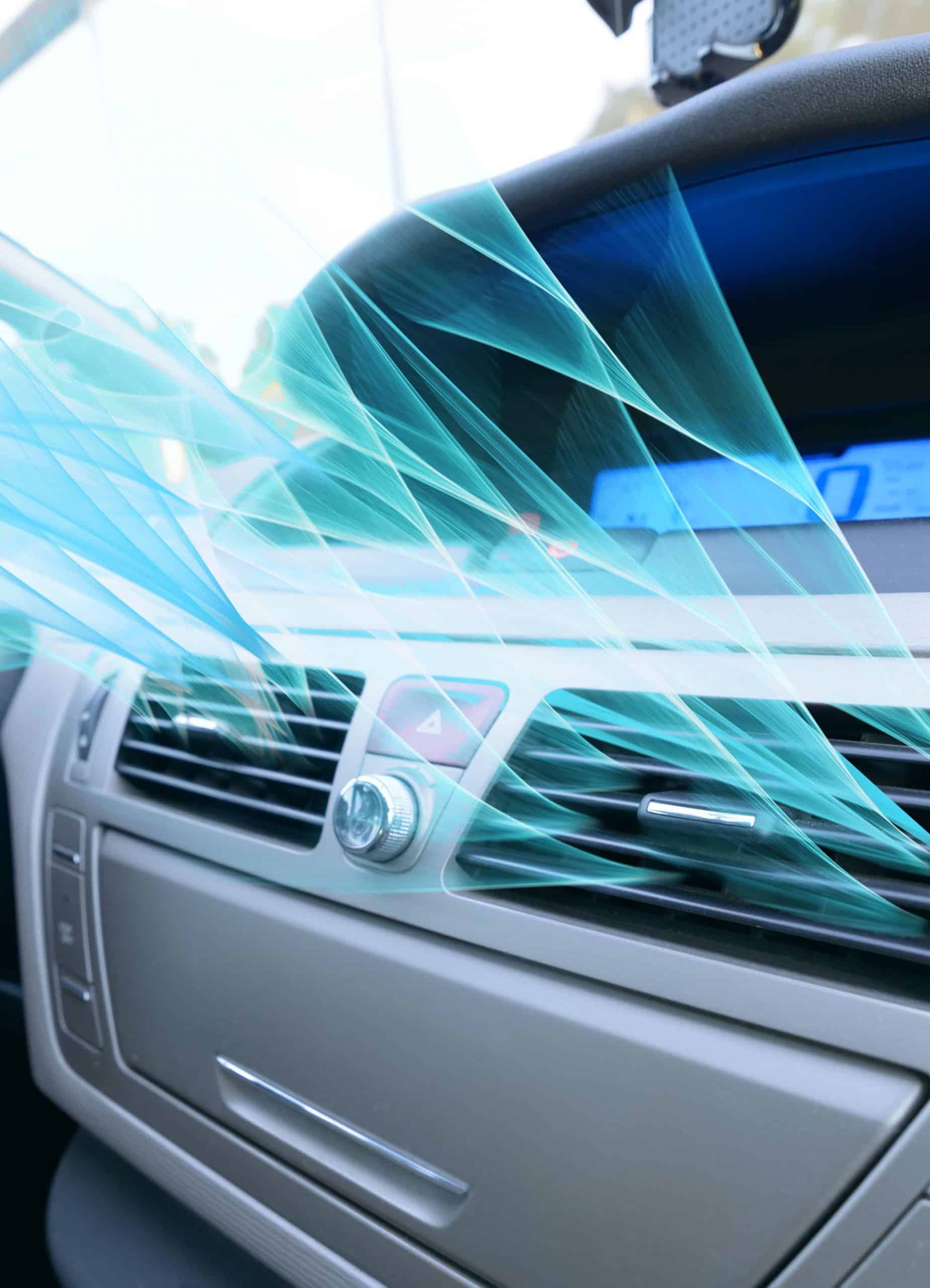 Illustrative photo of cool air flowing through car air conditioning unit